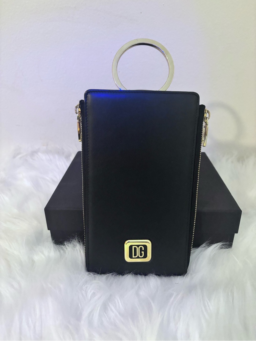 Authentic Dolce &Gabbana Black wallet with Gold Ring Handle.
